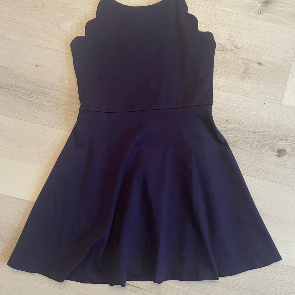 Cute black dress, worn one time. Medium youth girls